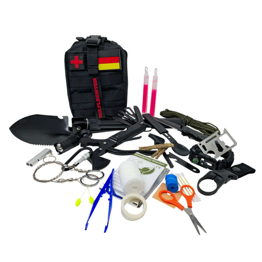 Großes Survival Kit mit Erste-Hilfe-Ausrüstung, Werkzeugen und Camping-Utensilien für Outdoor-Abenteuer.